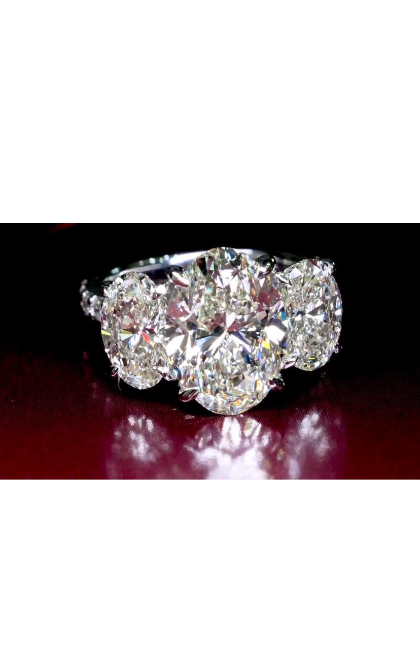Oval Cut GIA Certified 8.00 Carat Oval Shape Diamonds 18K Gold Trilogy Ring For Sale