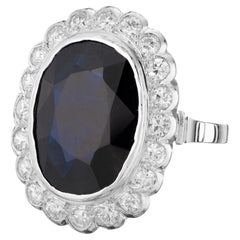 Anillo de compromiso en platino con halo de diamantes y zafiro azul certificado por GIA de 8,01 quilates