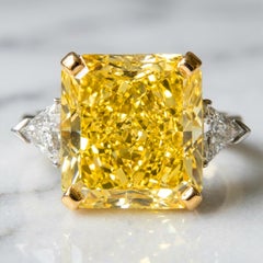 GIA Certified 8.01 Carat Fancy Intense Yellow Diamond Ring with Trapezoid Side