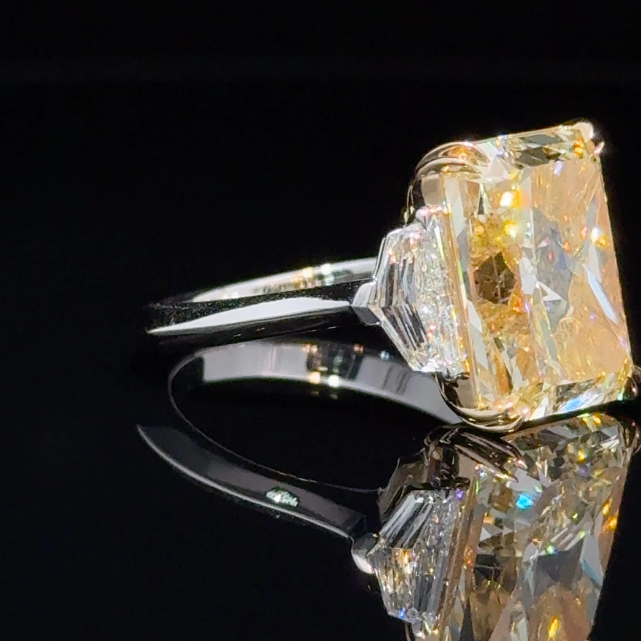 GIA Certified 8.01 Rectangular Radiant Cut Yellow Diamond Three Stone Ring In New Condition For Sale In New York, NY