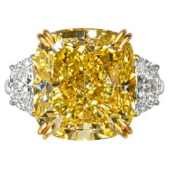 GIA Certified 10 Carat Fancy Intense Yellow Cushion Diamond Three-Stone Ring