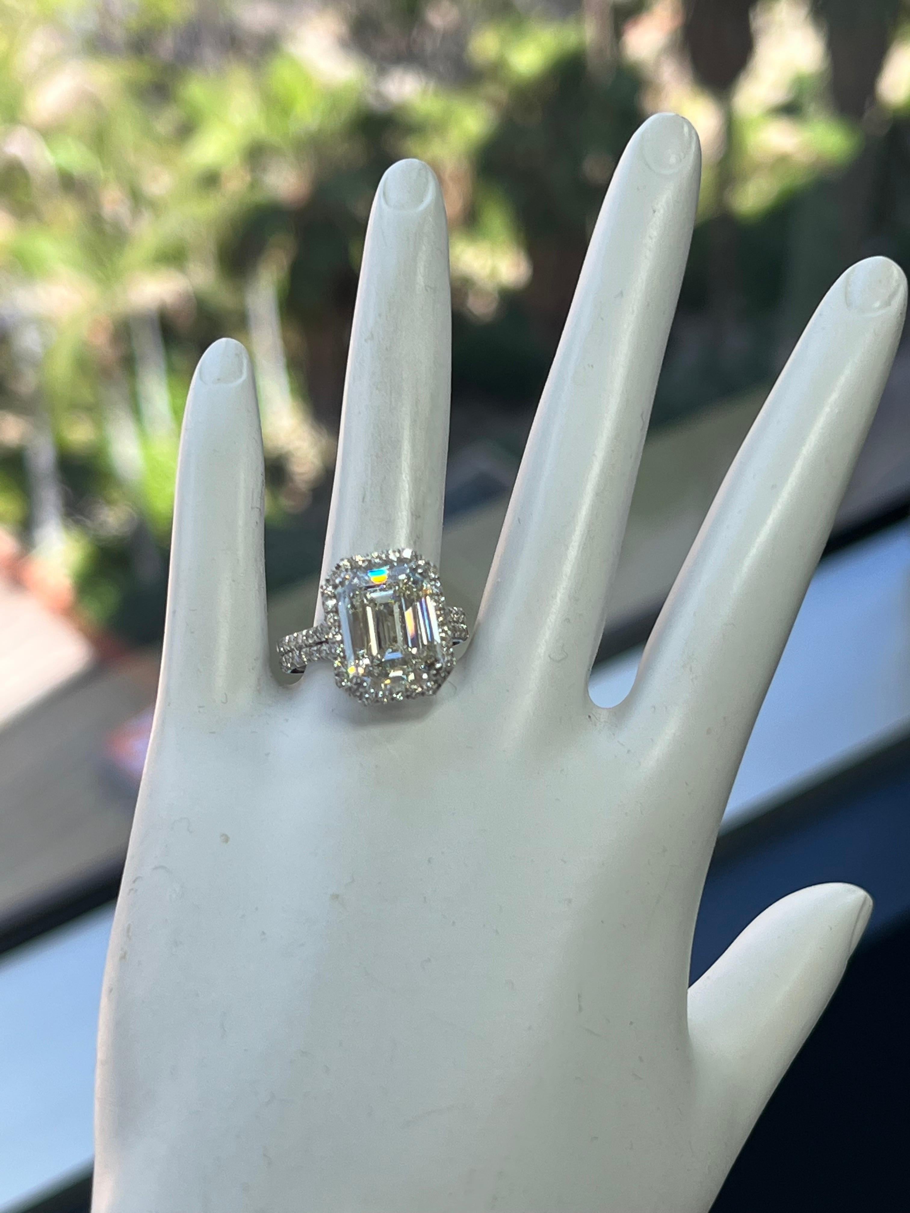 Modern GIA Certified 8.02 Carat L VS2 Natural Emerald Cut Diamond Engagement Plat Ring