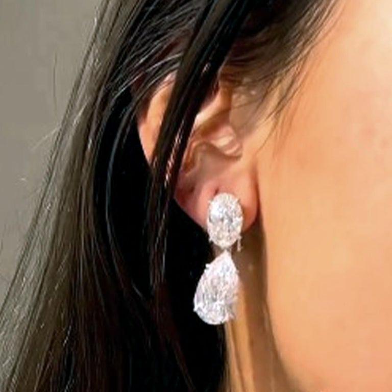 An exquisite pair of earrings made by pear cut diamonds, suspending oval diamonds

pear diamonds weighing 6 carats together D/E in color and VS2 in clarity!
oval shaped diamonds weighing 2 carats both flawless and d color!



