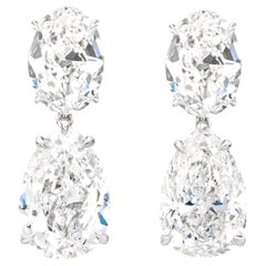 Certificato GIA da 8.06 carati. Orecchini a pera e diamante ovale