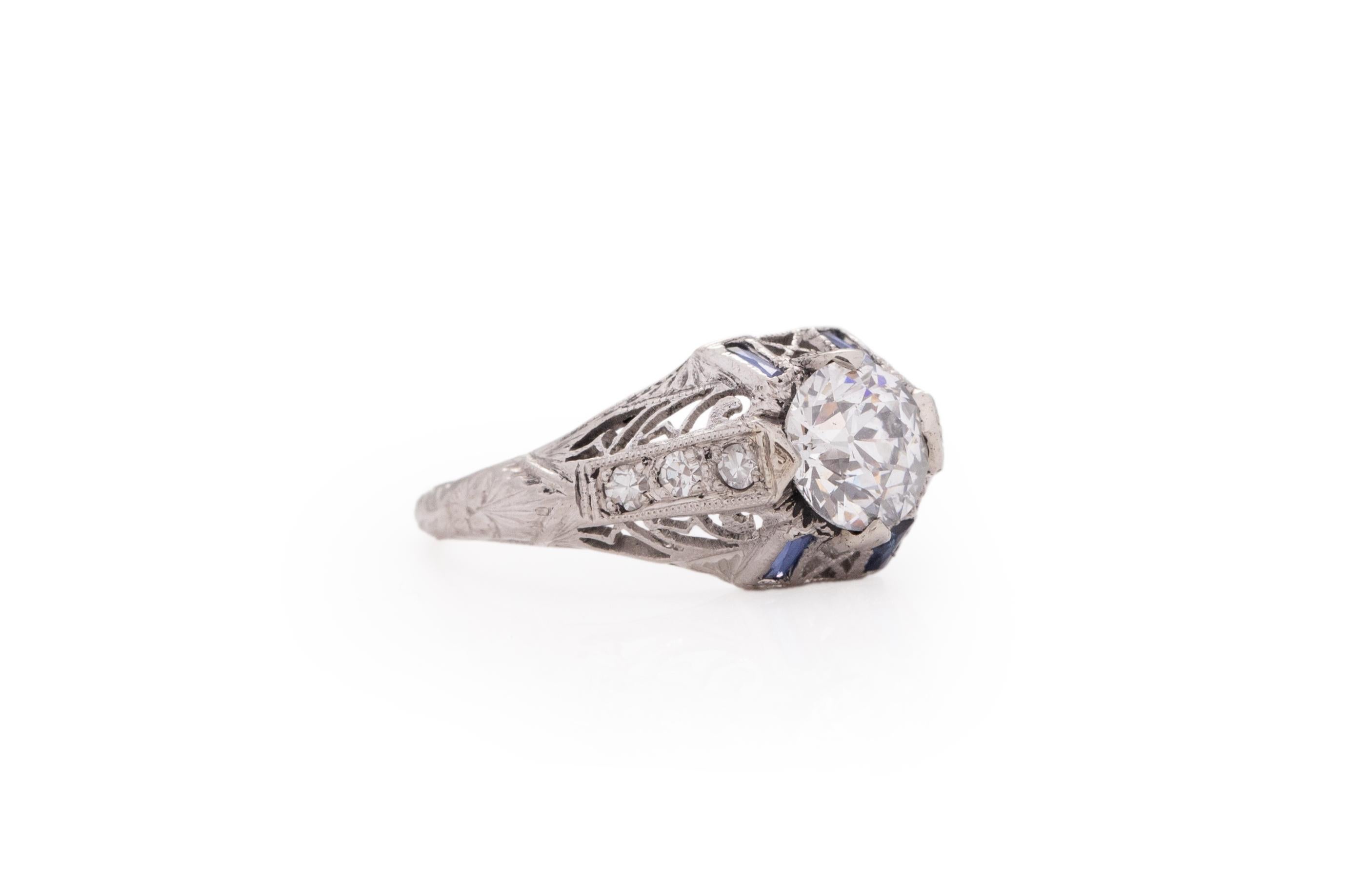 Ring Size: 4.25
Metal Type: Platinum [Hallmarked, and Tested]
Weight: 3.1 grams

Center Diamond Details:
GIA REPORT #:6217737664
Weight: .82 carat
Cut: Old European brilliant
Color: E
Clarity: SI2
Measurements: 6.05mm x 5.93 x 3.85

Side Stone