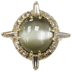 Retro GIA Certified 8.25 Carat "Cats-Eye" Chrysoberyl in 18 Karat Gold with Diamonds