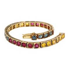 Bracciale da tennis in oro giallo con cerniera, certificato GIA, con 8,25 carati di rubino e zaffiro rotondi