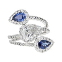 GIA Certified .83 Carat Pear Cut Diamond and Sapphire Triple Bypass Ring