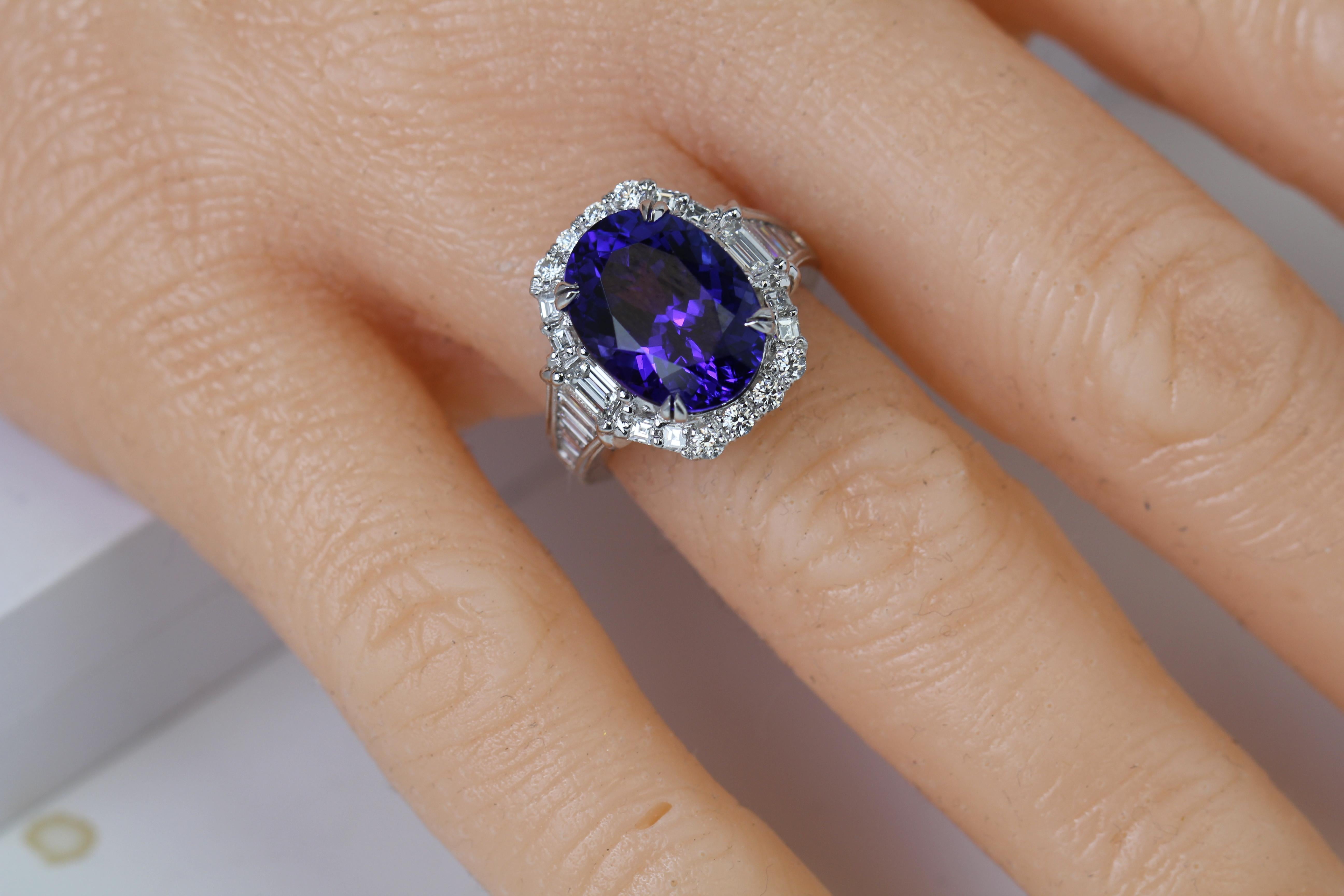 Contemporary GIA Certified 8.30 Carat Oval Cut Blue-Violet Tanzanite and Diamond Ring ref537 For Sale