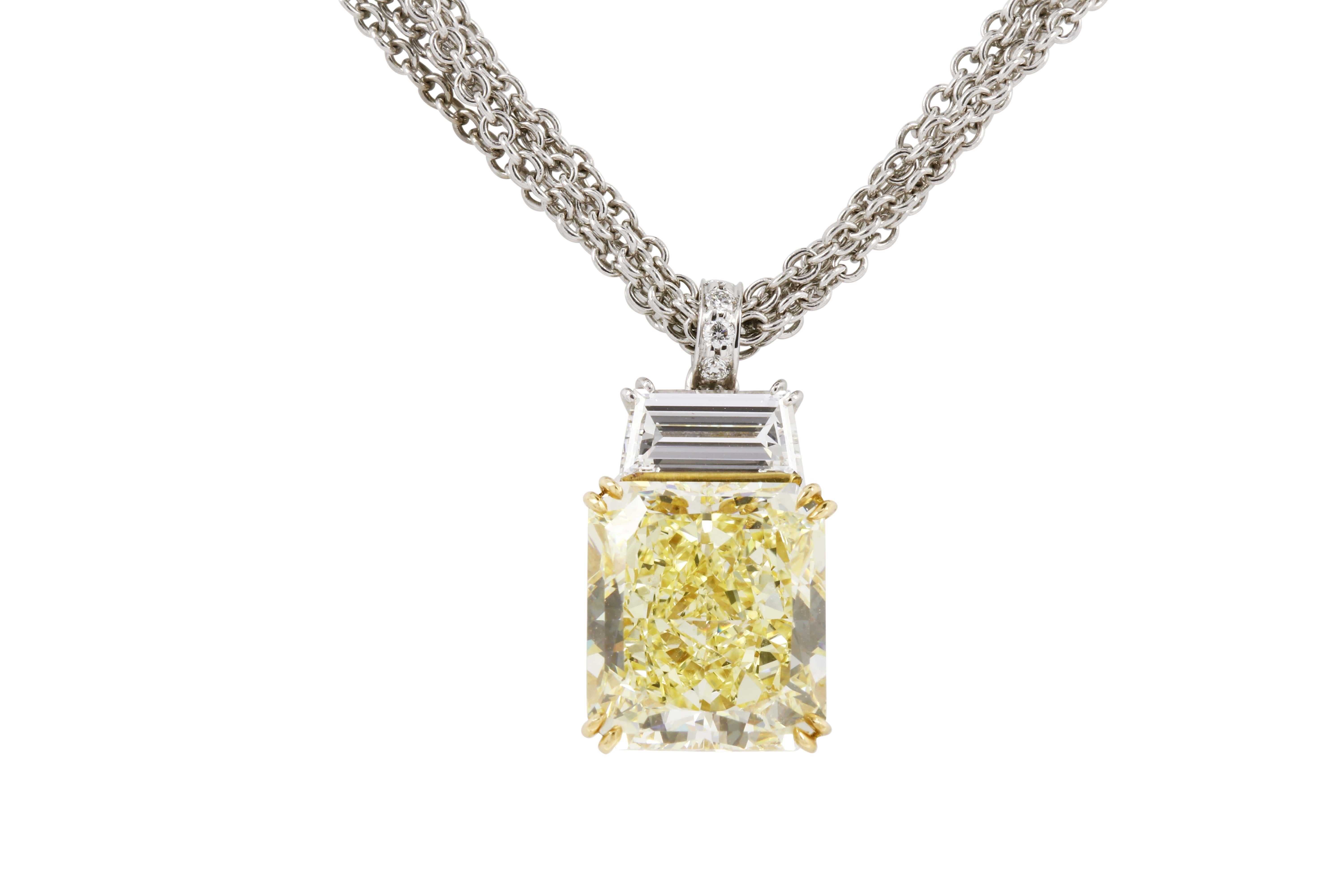 Featuring a rare, radiant-cut natural yellow diamond, weighing 8.32 carats, suspended from a hexagon-shape diamond weighing 0.76 carats. Accompanied by a GIA diamond report stating that the diamond is natural Fancy Yellow Colour, Internally Flawless