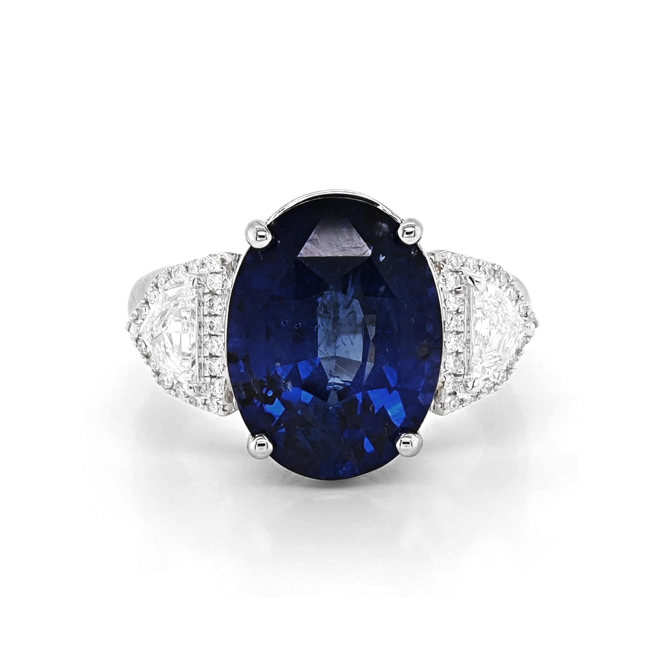 1 Sapphire Gemstone: 7.84 Carats
40 White Diamonds: 0.51 Carats
Metal: 18K White Gold, 6.70 Grams
GIA Certificate # 2231057494

