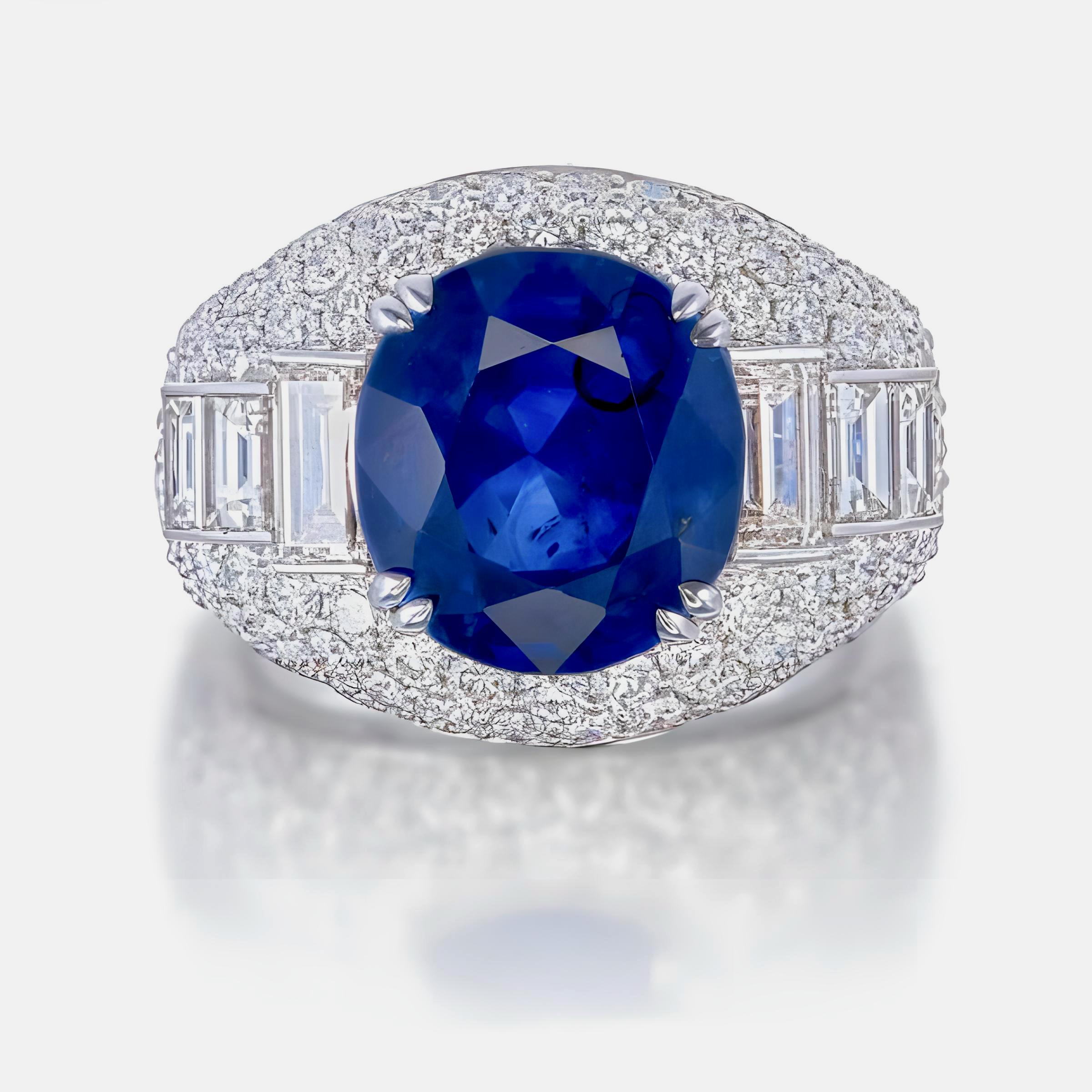 This ring showcases an 8.38-carat GIA-certified oval-cut blue sapphire from Sri Lanka, heated to bring out its vivid color (certificate number GIA1503212048). Surrounding this center stone are 2.55 carats of round-cut diamonds and 1.29 carats of