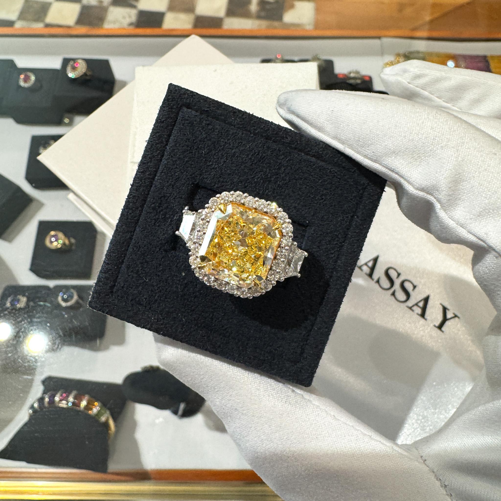 Modern GIA Certified 8.39 Carat Fancy Intense Yellow Diamond 18K White Gold Halo Ring For Sale