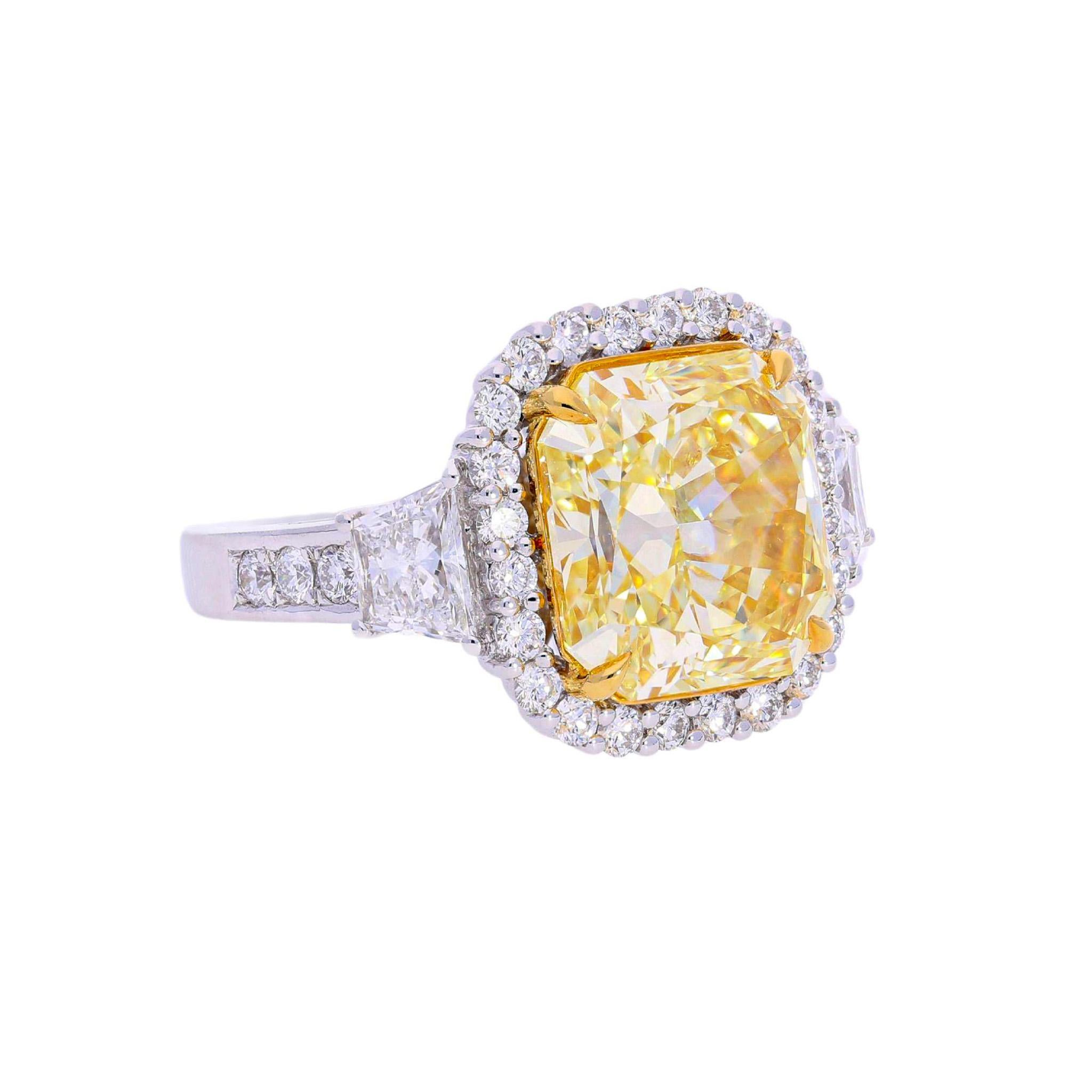 Women's GIA Certified 8.39 Carat Fancy Intense Yellow Diamond 18K White Gold Halo Ring For Sale