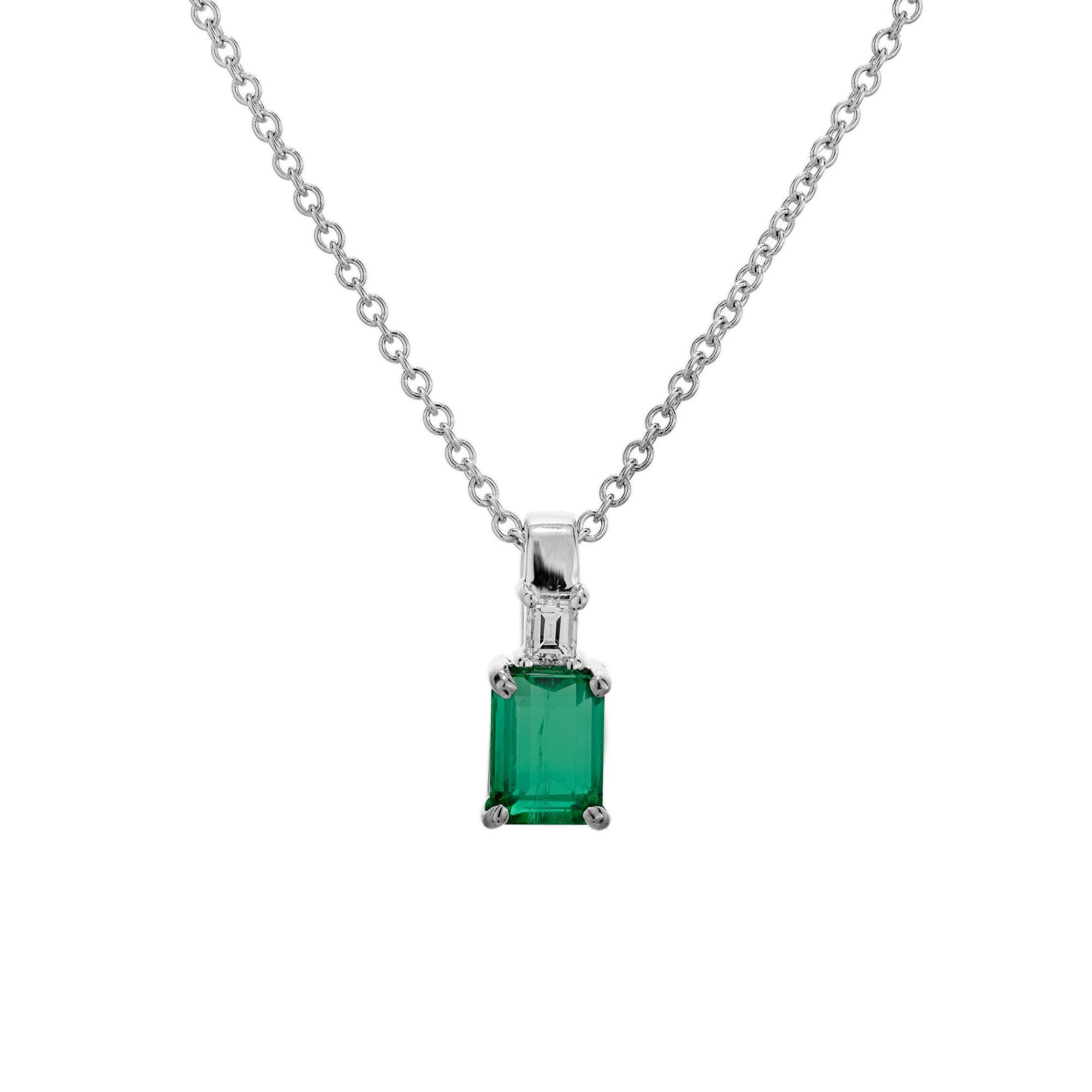 Natural GIA Certified Emarald and diamond pendant necklace. GIA certified .84 carat octagonal emerald set in a simple 4 prong 14k white gold setting, accented with 1 step cut square diamond. 18 inch 14k white gold chain. Designed and crafted in the
