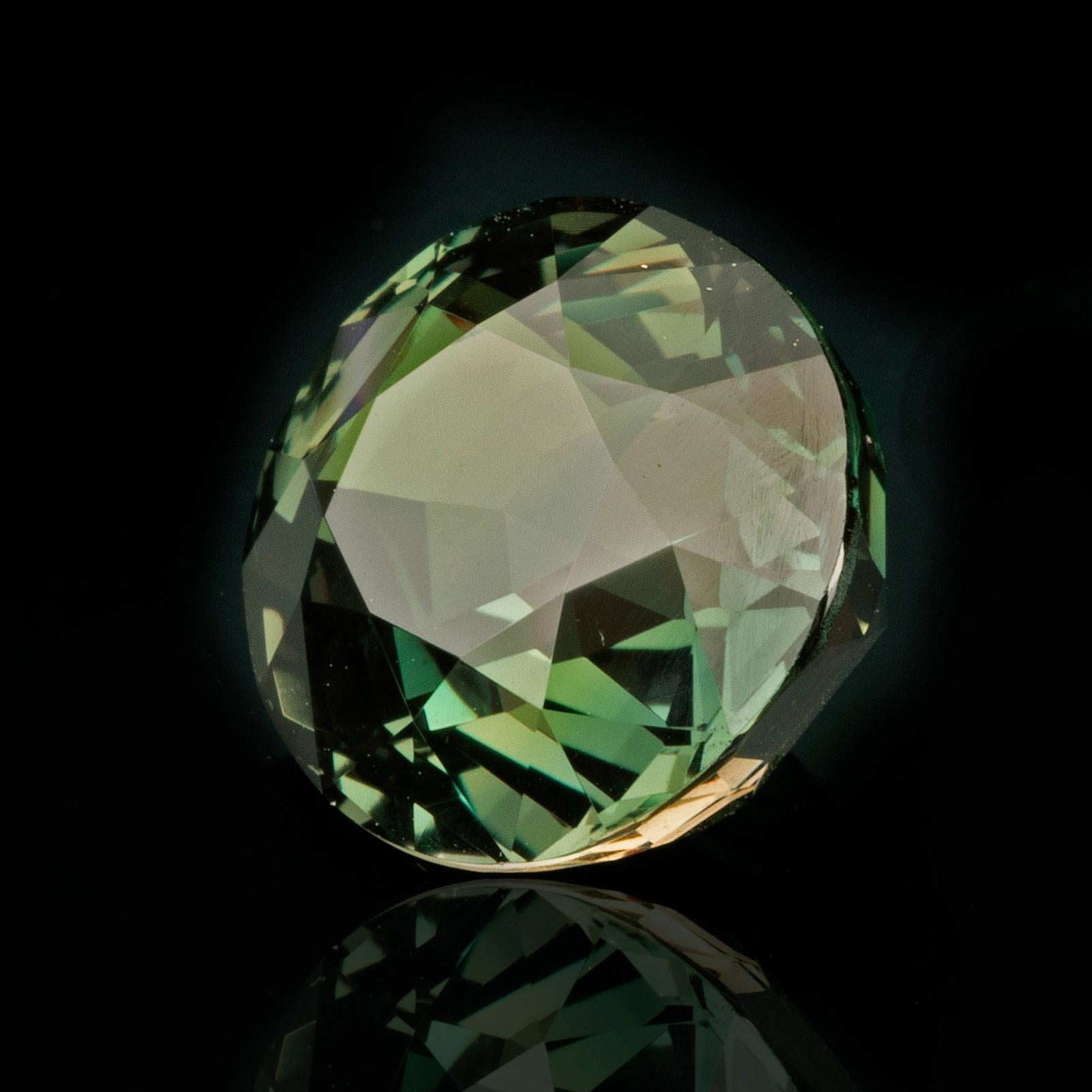 This stunning oval 8.41 carat genuine alexandrite – a rare color-change variety of chrysoberyl – is a beautiful saturated bluish green in natural lighting and drastically shifts to a deep pink-purple. Mined in Sri Lanka and cut expertly to enhance