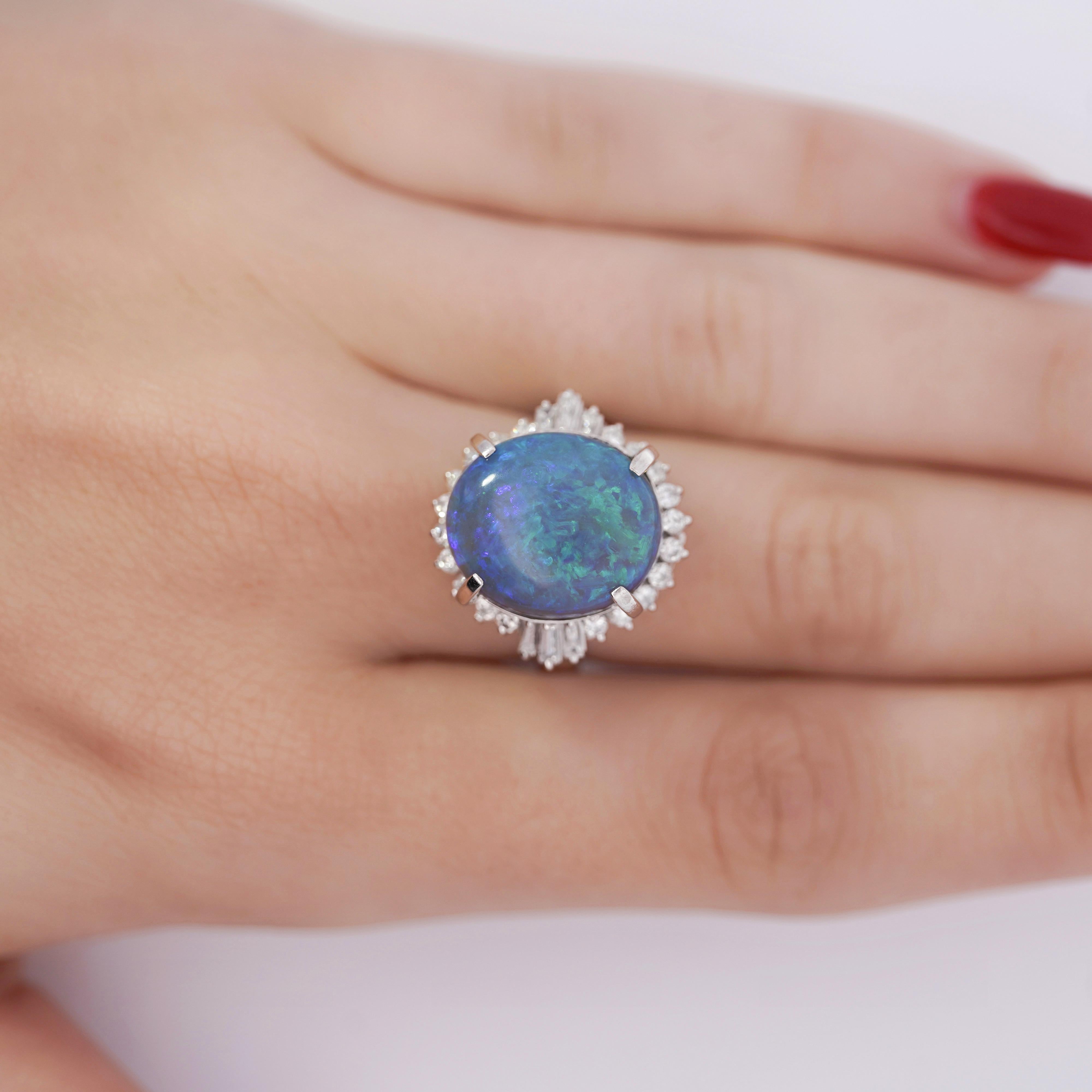 GIA zertifiziert Vintage 8,45 Karat natürlichen schwarzen Opal & 0,70 Karat Diamant Halo in Platin 900 Halo Set Cocktail-Ring, Größe 6,75.

Einzelheiten:
Artikel Typ: Cocktail-Ring
Metall: Platin 900
Größe: 6,75 (einstellbar)
Gewicht: 12,07