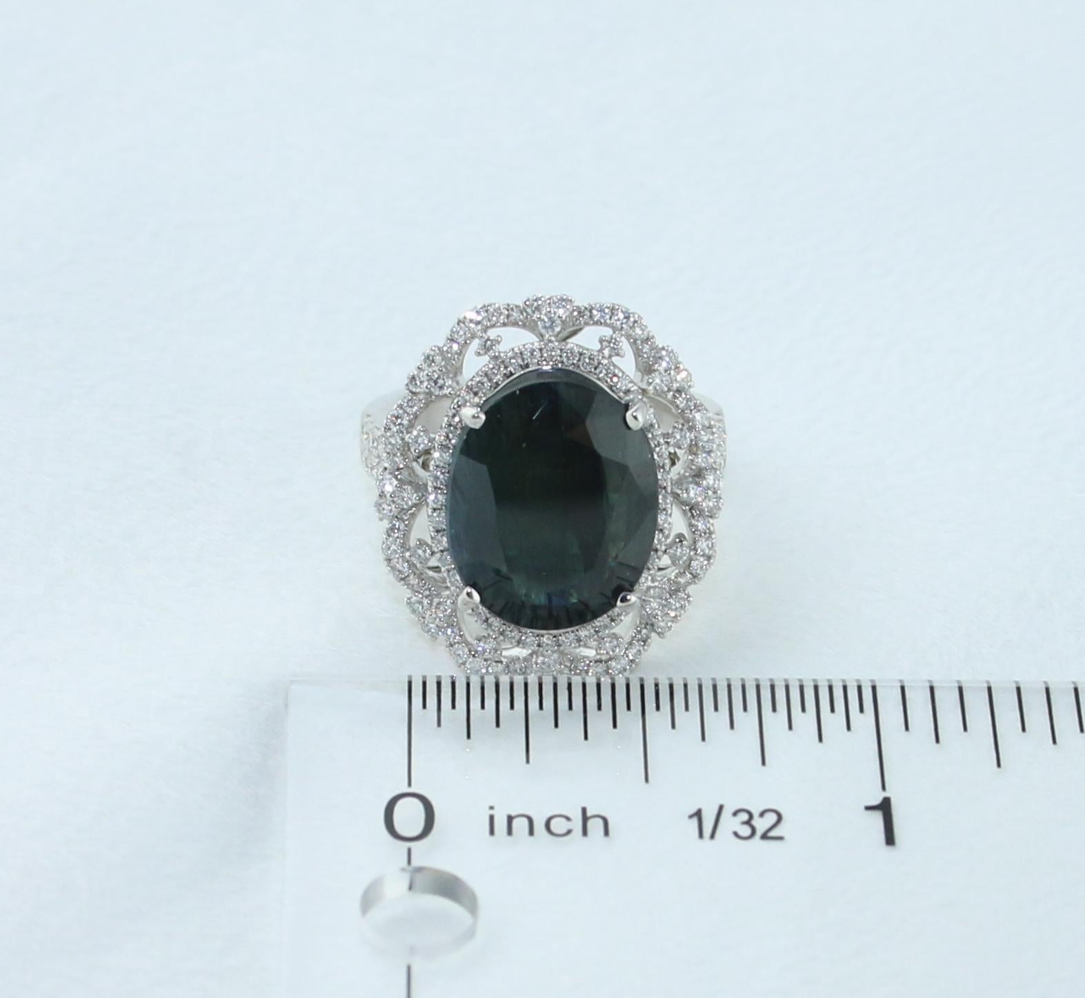 GIA Certified 8.49 Carat Oval Dark Greenish Blue Sapphire and Diamond Ring In New Condition For Sale In New York, NY