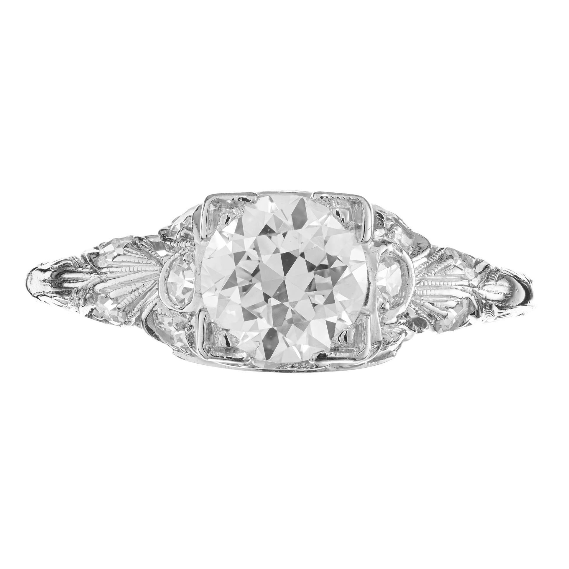 Original 1930's Art Deco diamond engagement ring. This ring begins with a dazzling .85ct round brilliant cut center diamond. Mounted in a platinum setting and accented by 10 single cut diamonds. The GIA has certified the diamond as G, near colorless