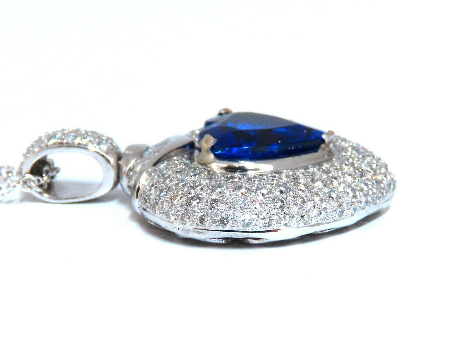 GIA Certified Tanzanite Heart Raised Dome

8.50ct. Natural Tanzanite Necklace

VS clean clarity

Brilliant Heart cut

13.78 x 14.10 x 7.46mm 

Report #6213319199

3.00ct round diamonds

& Baguettes on Arch

G-color & Vs-2 clarity.

Overall Pendant