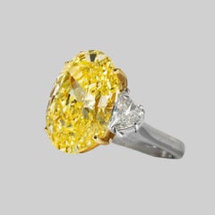 GIA Certified 5 Carat Fancy Light Yellow Oval Diamond Ring