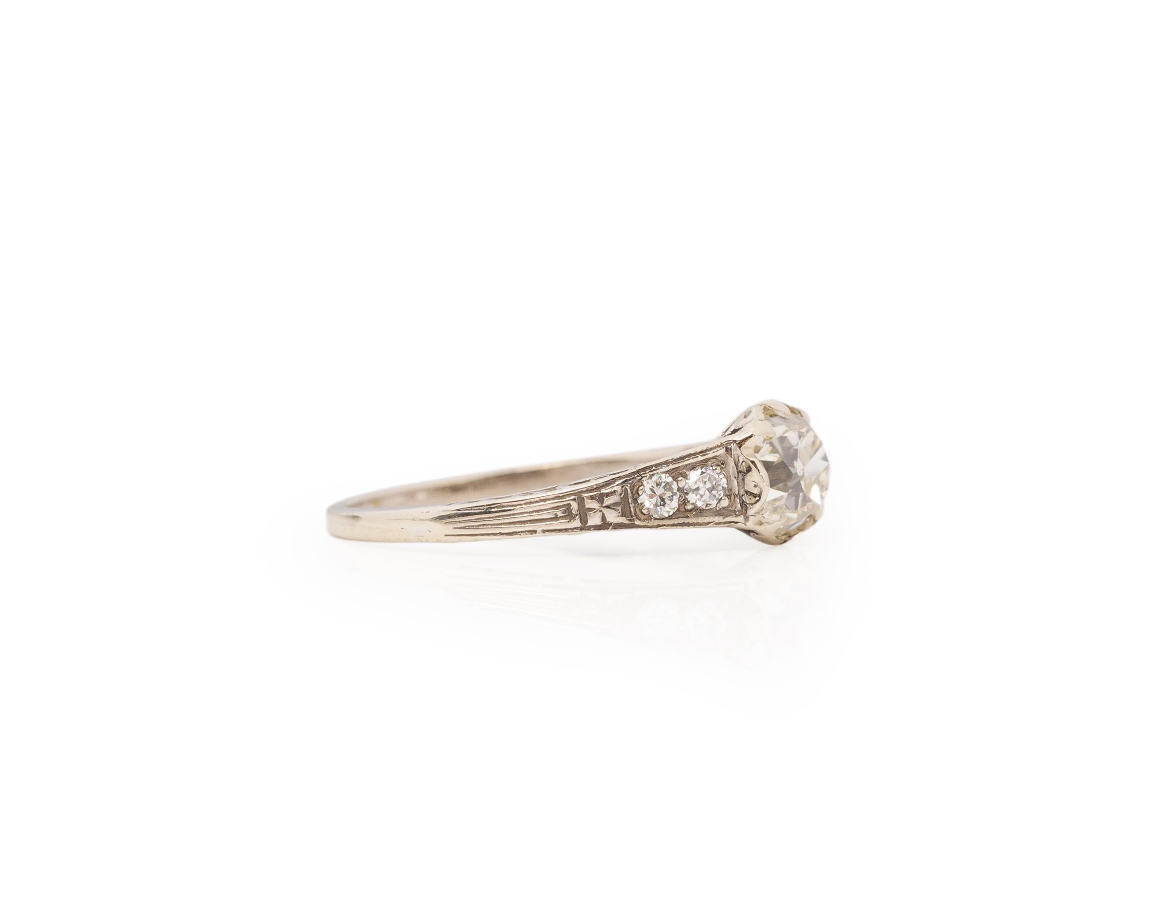 Taille de l'anneau : 5.25
Type de métal : Or blanc 14K [poinçonné et testé].
Poids : 1.6 grammes

Détails du diamant central :
RAPPORT DE LABORATOIRE GIA # : 6223834185
Poids : .86ct
Coupe : Brillant ancienne mine
Couleur : A&M
Clarté :