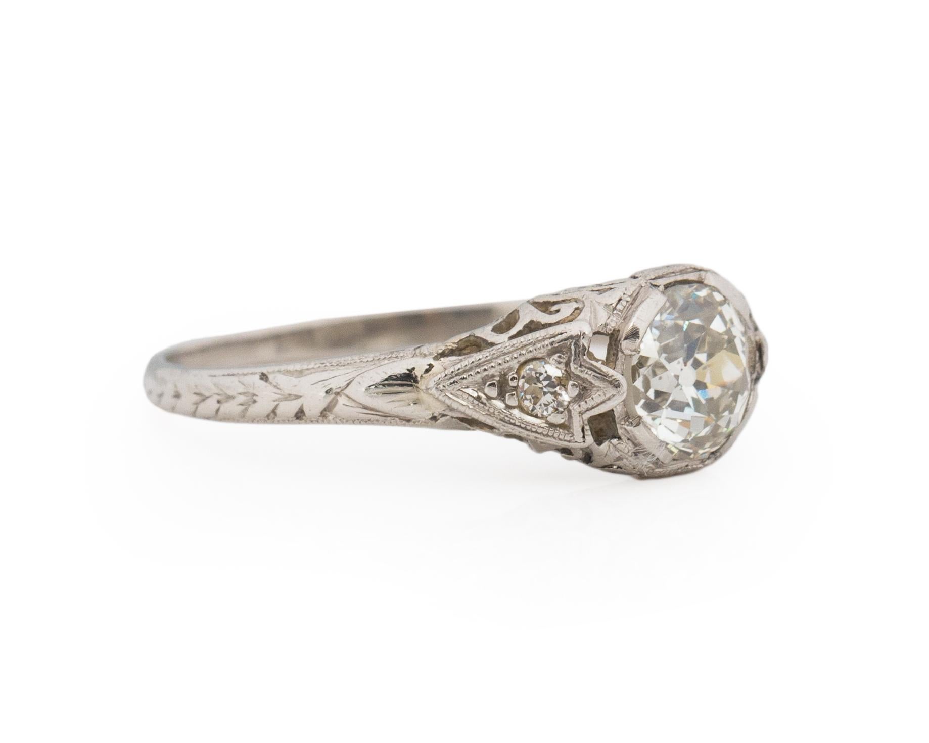 Ring Size: 5.75
Metal Type: Platinum [Hallmarked, and Tested]
Weight: 2.6 grams

Center Diamond Details:
GIA REPORT #: 2211385724
Weight: .86ct
Cut: Old European brilliant
Color: M
Clarity: SI1
Measurements: 5.78mm x 5.69mm

Side Stone