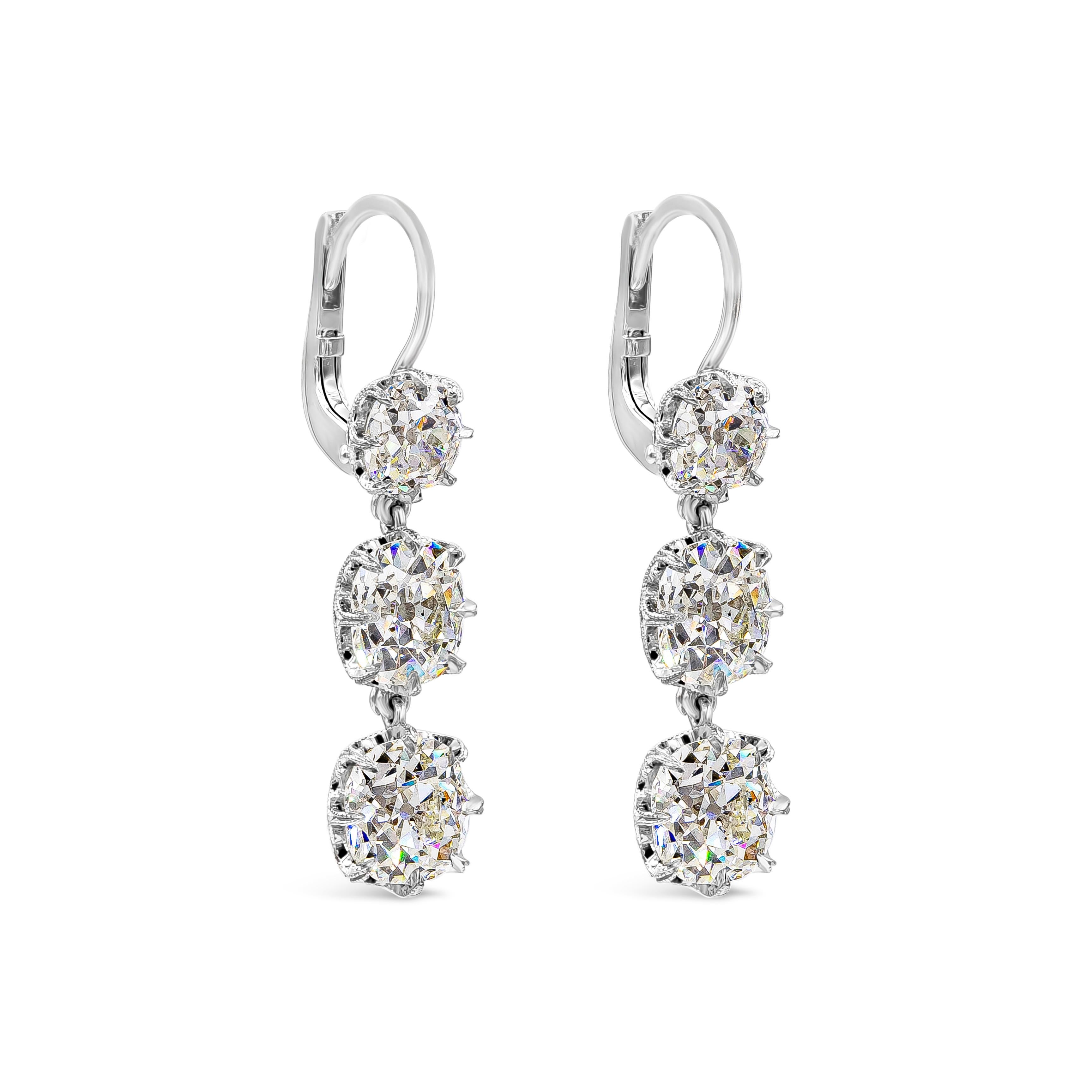 An unique and beautiful pair of drop earrings showcasing 8.64 carats total, old mine cut diamonds certified by GIA as H-J Color and SI2-I1 in Clarity. Hand-crafted and set in an intricately-designed basket. Lever-back mechanism, Made in