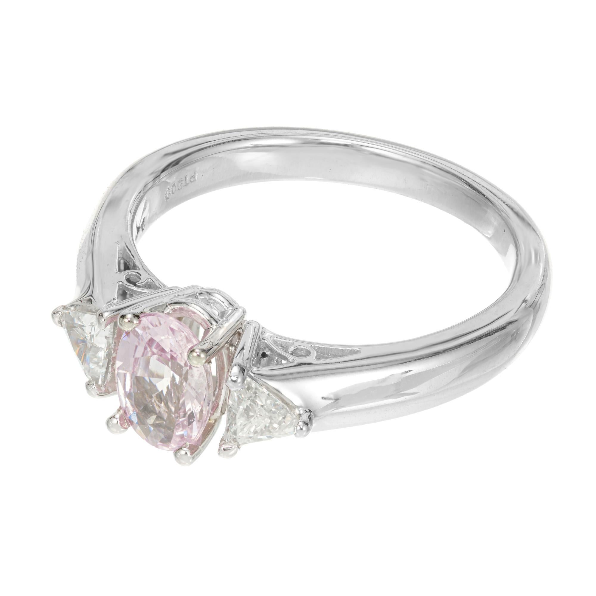 diamond ring with pink sapphire side stones