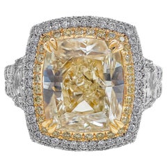 GIA Certified 8.77 Carat Yellow Diamond Three-Stone Halo Engagement Ring