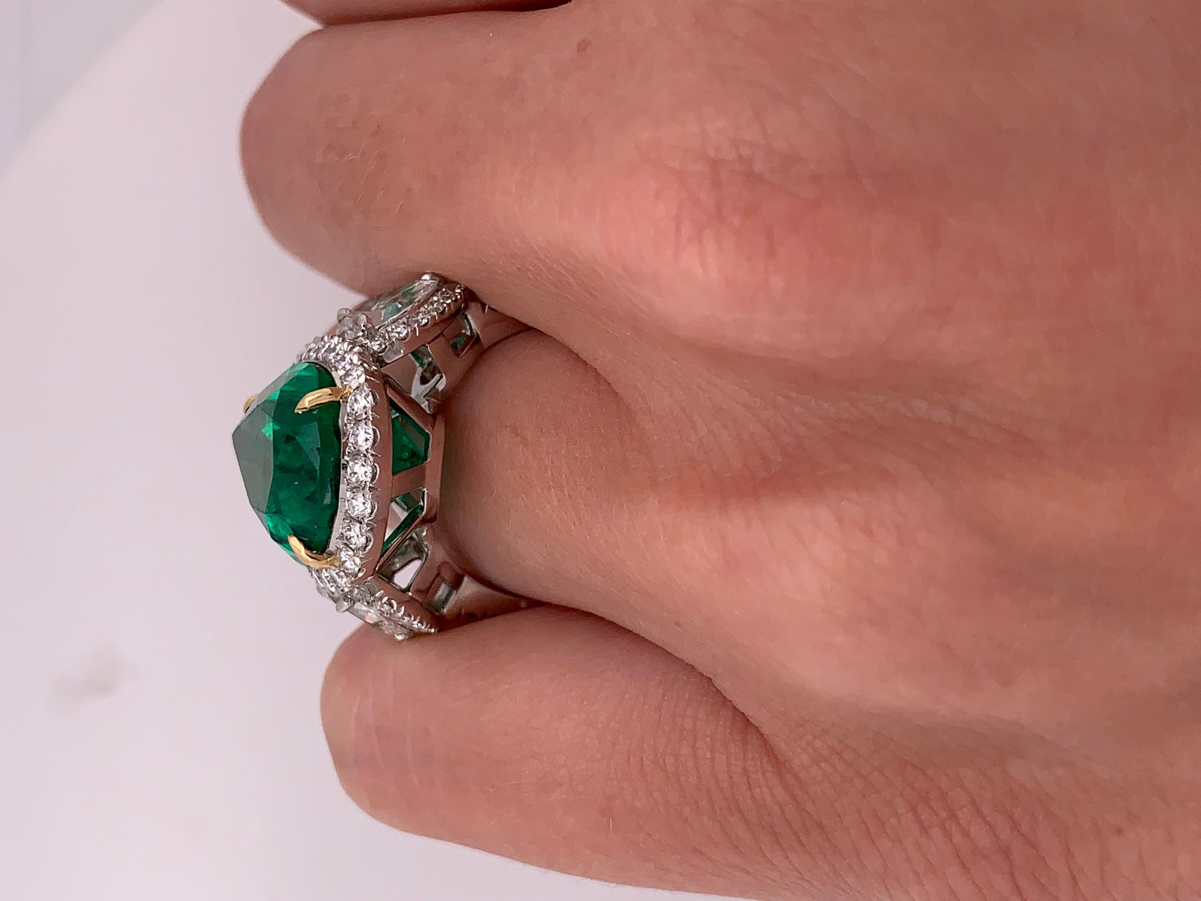 GIA Certified 8.78 Carat Green Emerald Pear Shaped Platinum Ring with Diamonds In New Condition For Sale In New York, NY