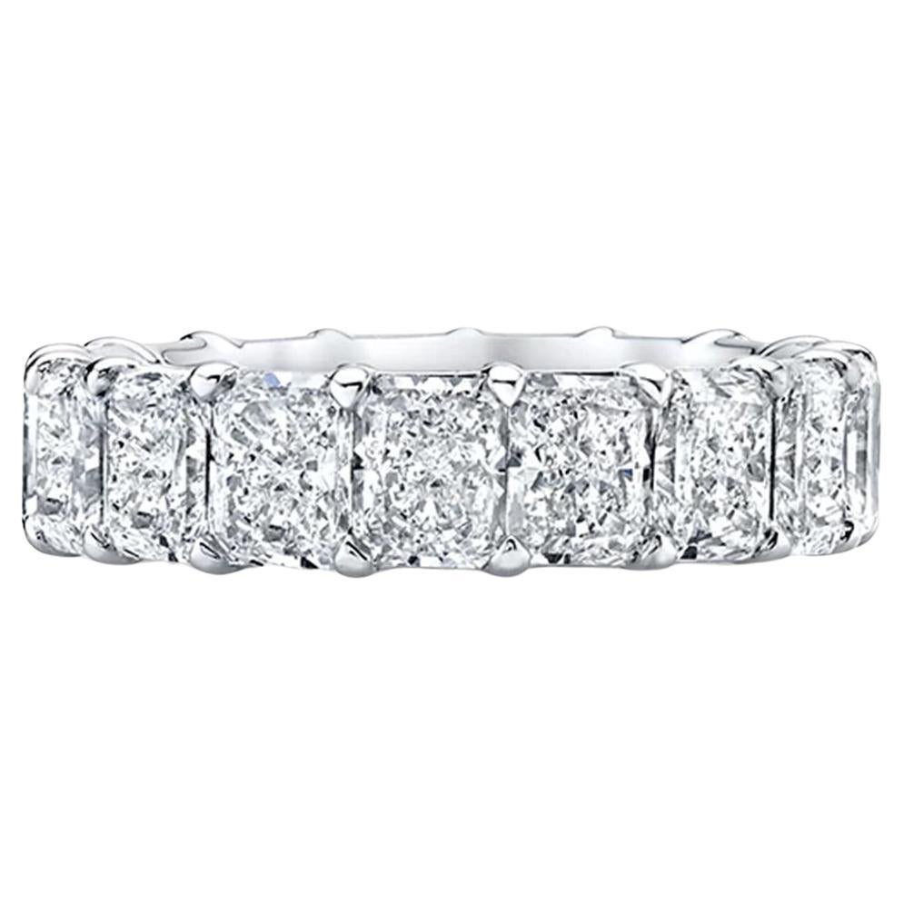 Introducing our exquisite Platinum Eternity Band, featuring 16 radiant cut diamonds, each expertly set in eagle claws to showcase their brilliance. With a total diamond weight of 8.86 carats, these H-I colored diamonds exhibit exceptional clarity