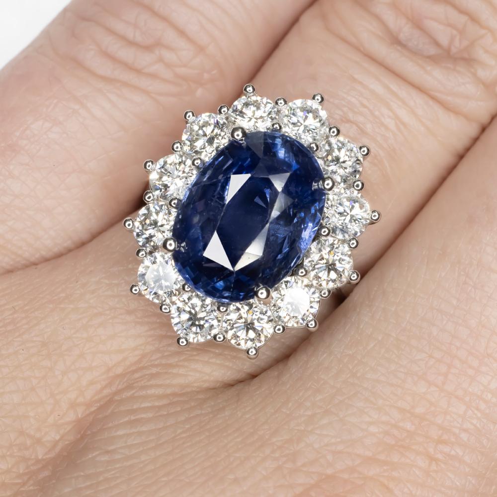 This one-of-a-kind piece features a 8.94 unheated and untreated natural blue Kashmir sapphire.

This exquisite handmade ring has 2 carats of the highest clarity and color

Sapphires with Kashmir origin commands the highest prices 

Kashmir sapphires
