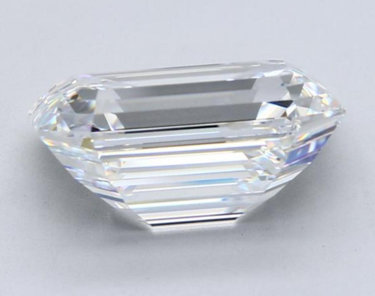 This gorgeous 9 Carat GIA certified emerald cut diamond ring is graded as D color and internally flawless clarity.

It is a gorgeously sophisticated cut that offers bright and lively sparkle and exceptional fiery brilliance! 

The main stone is a 9