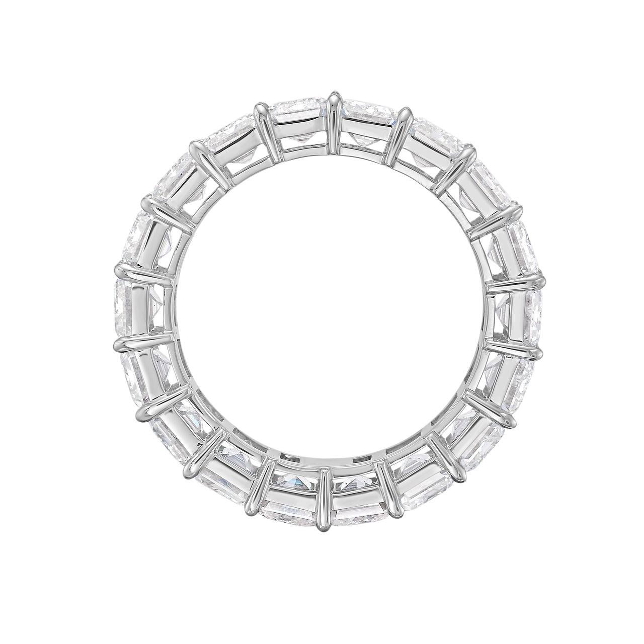 This exquisite bespoke set features a stunning 9-carat emerald cut eternity band ring crafted in 18K white gold, customized exclusively for the client.

The diamonds, hand-selected for their superior brilliance and beauty, are of H-I color and