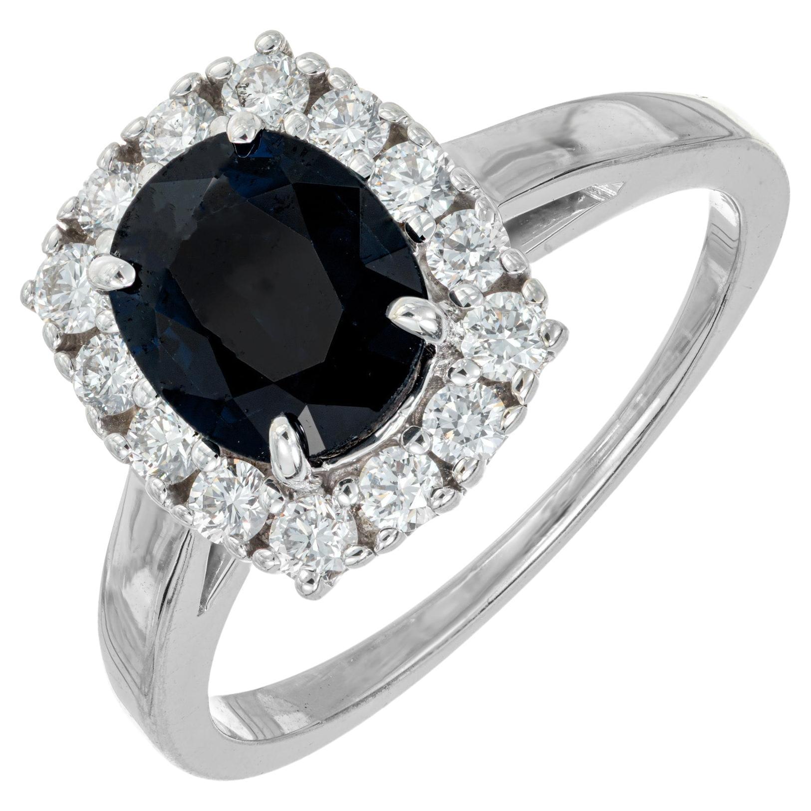 GIA Certified .90 Carat Oval Sapphire Diamond Halo White Gold Engagement Ring For Sale