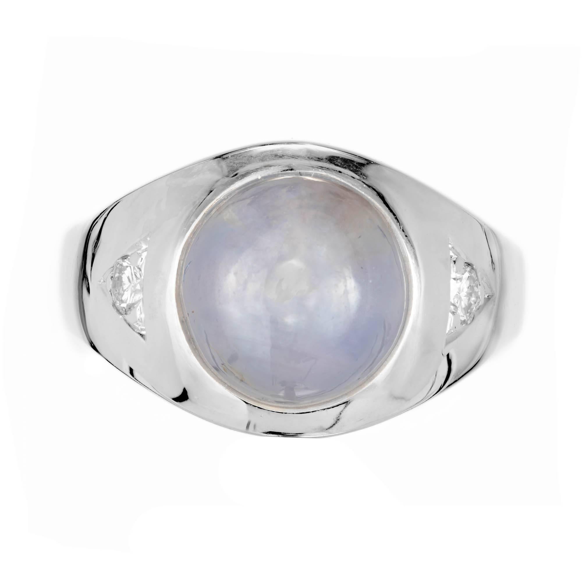 14k white gold blue gray star sapphire and diamond men's ring. Round blush gray star sapphire bezel set in a triangular cut out in a white gold high polish ring. GIA certified.

1 round cabochon star sapphire bluish gray Approximate 9 carats. GIA