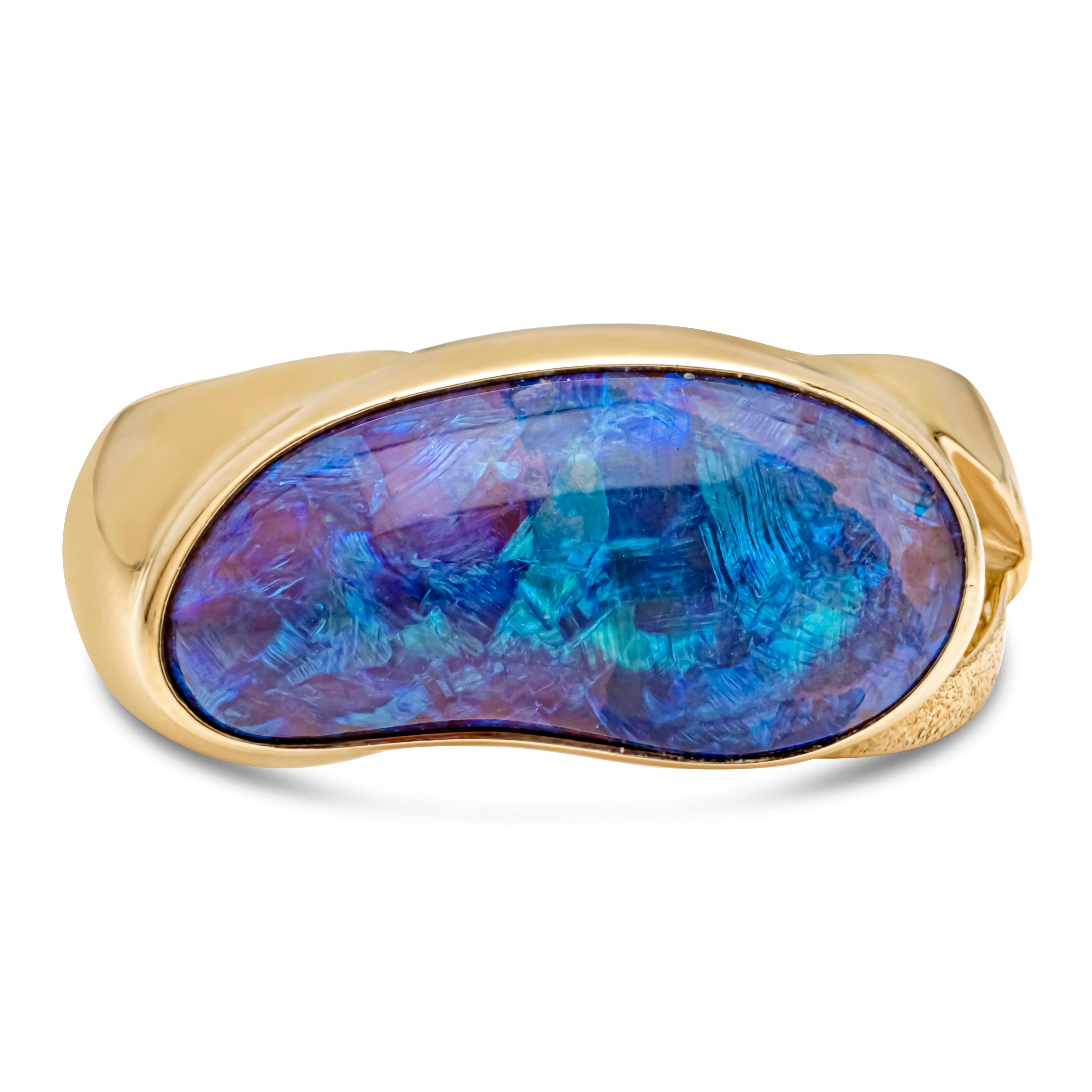 Showcasing a stunning and beautiful GIA certified 9.00 carats natural black opal freeform gemstone perfectly set in 18k yellow gold. Size 8.75 US resizable upon request, 11.60 mm in length and 23.16 mm in width.

Style available in different price