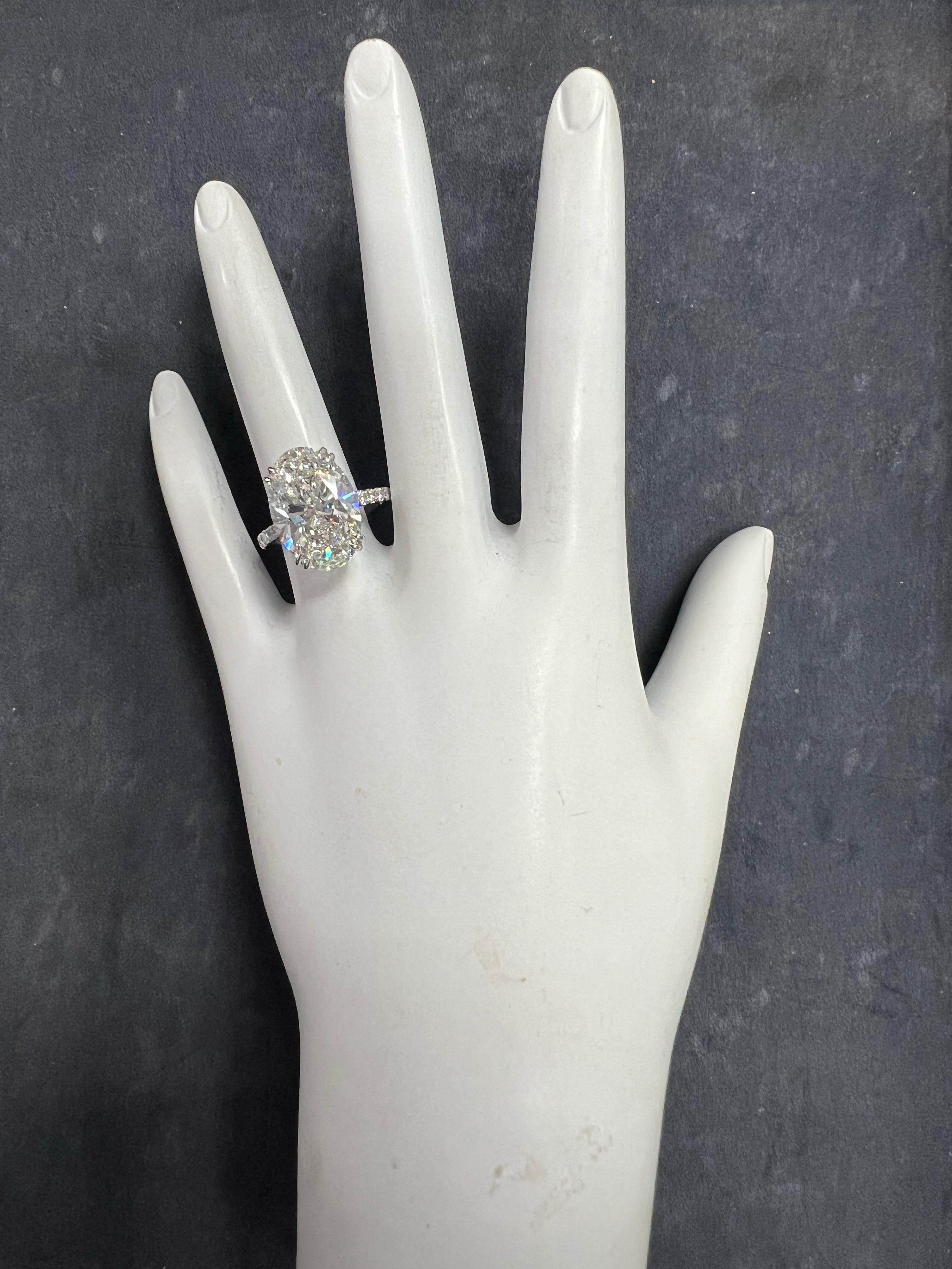 Modern GIA Certified 9.01 Carat Natural Oval Brilliant G Color Diamond Engagement Ring For Sale