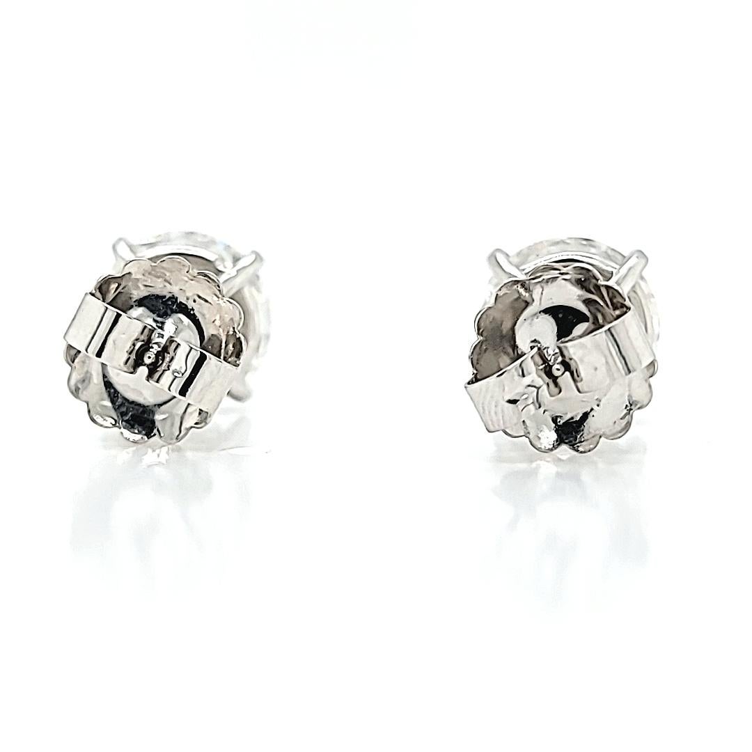 Round Cut GIA Certified 9.01 Carats Total Round Diamond Studs