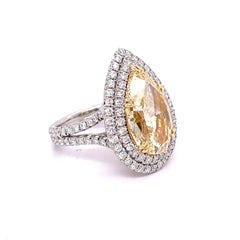 GIA Certified 9.02 Fancy Yellow Pear Cut Engagement Ring