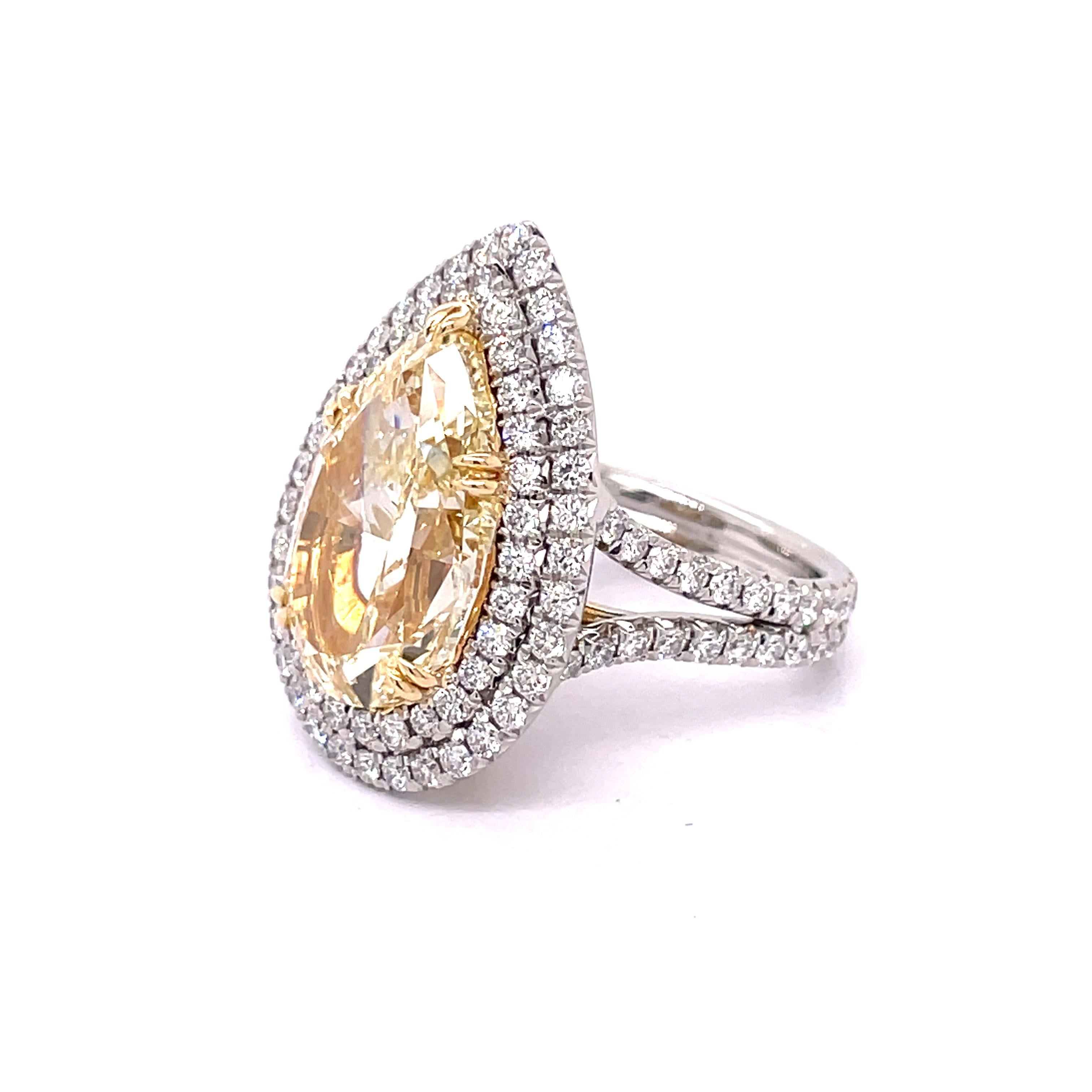 GIA Certified 9.02 Fancy Yellow Pear Cut Engagement Ring For Sale at ...