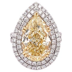 GIA Certified 9.02 Fancy Yellow Pear Cut Engagement Ring