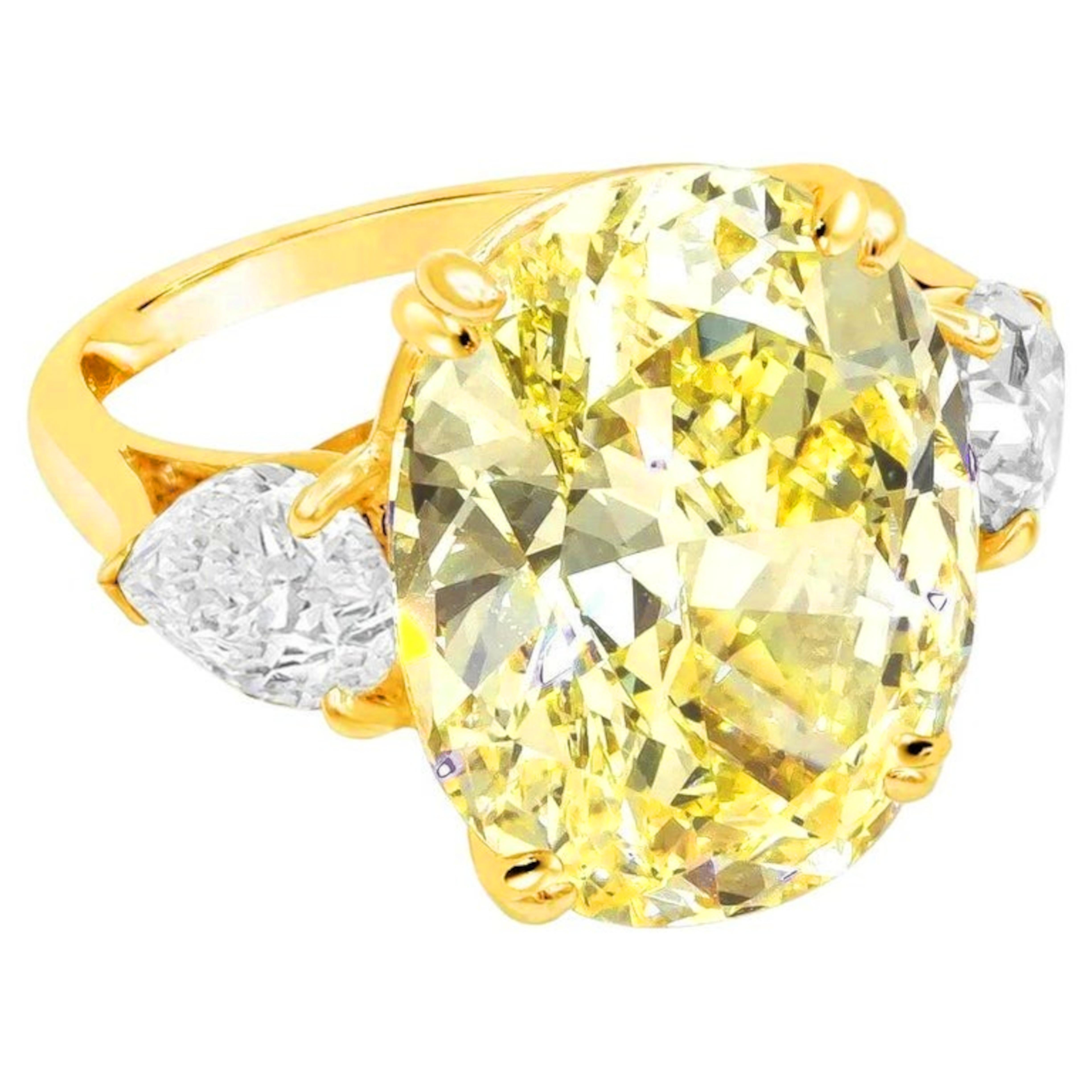 GIA Certified 9.06 Carat Fancy Light Yellow Oval Cut Diamond Ring In New Condition For Sale In Chicago, IL