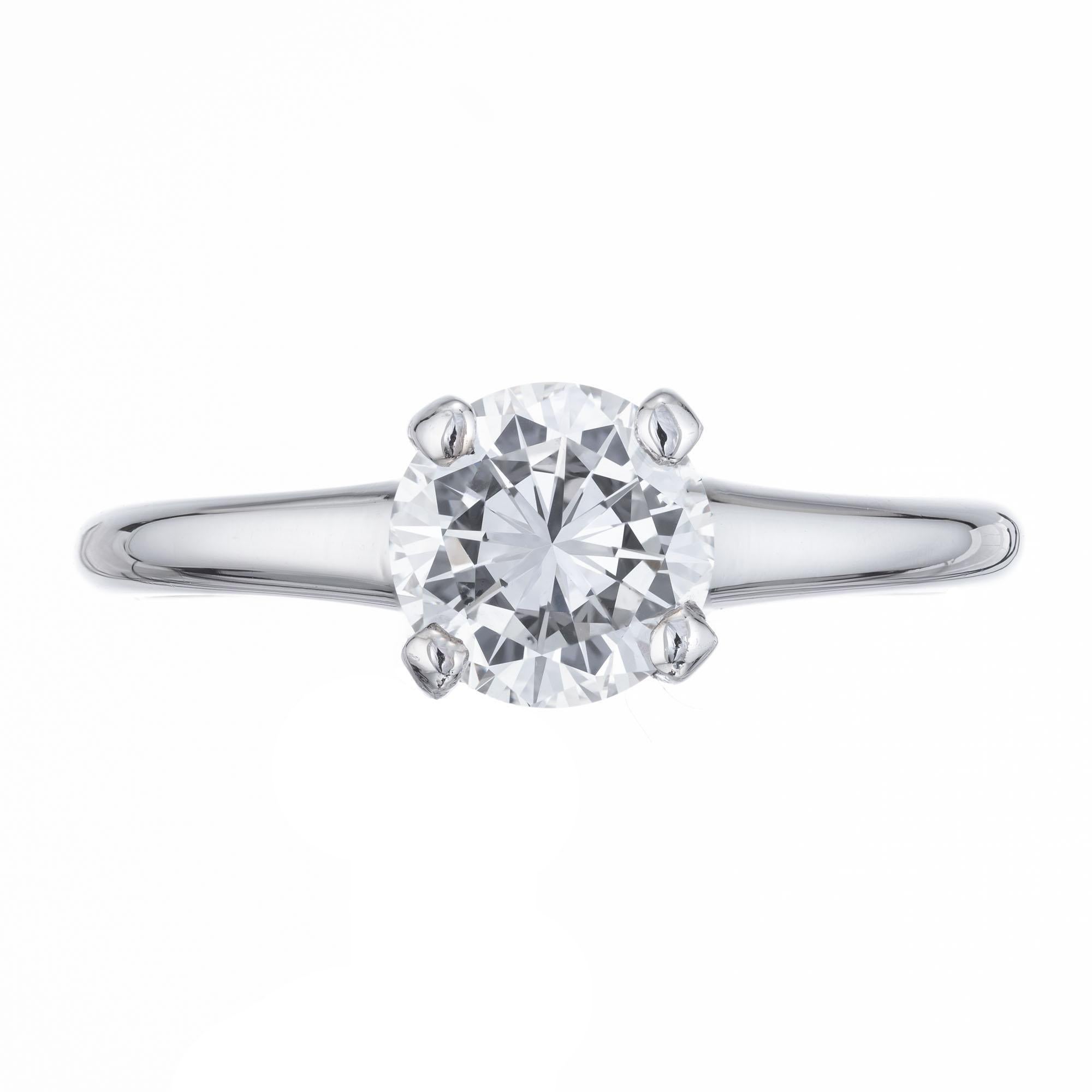 European transitional cut diamond engagement ring. GIA certified center stone in a 4 prong platinum solitaire setting. 

1 round diamond E VS2, approx. .91cts GIA Certificate # 5172036979
Size: 5.75 and sizable. 
Platinum 
Stamped: 10% irid