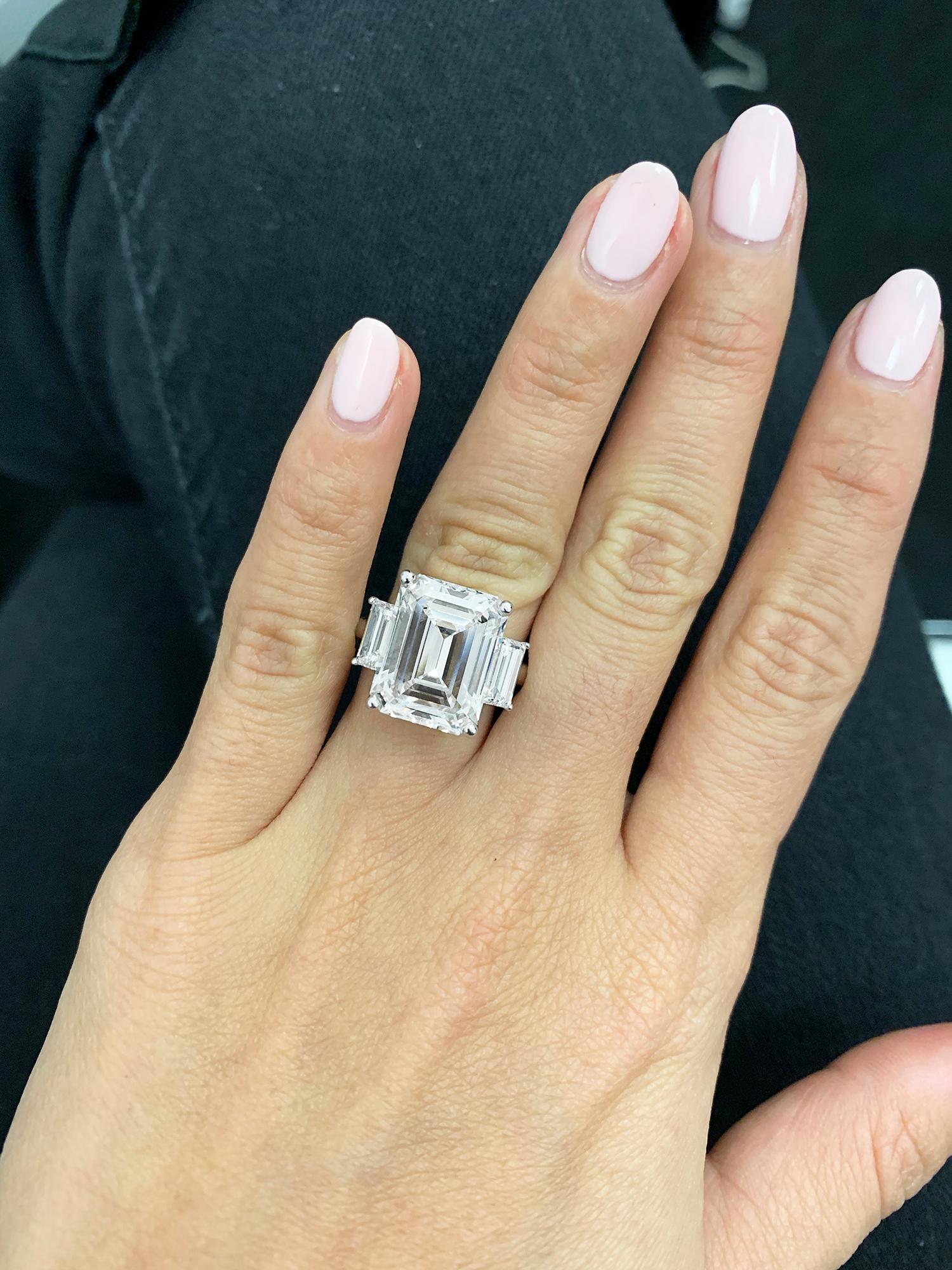 Contemporary GIA Certified 9.10 Carat Emerald Cut Diamond Three-Stone Ring