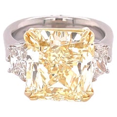 GIA Certified 9.13 Carat Fancy Yellow Radiant Cut Three-Stone Engagement Ring