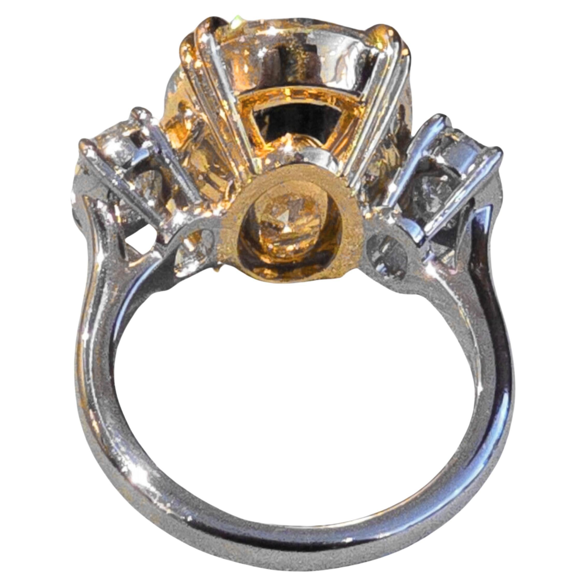 Oval Cut GIA Certified 9.13 Ct. Oval Fancy Yellow Oval Diamond Ring For Sale