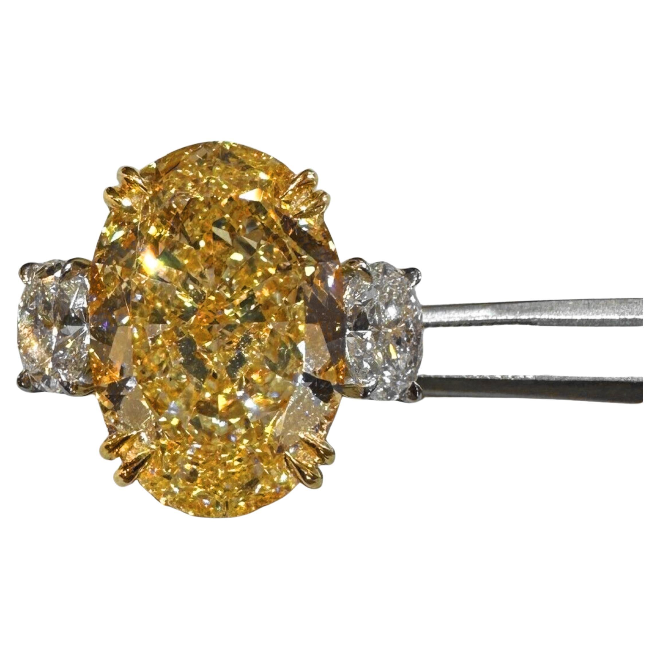GIA Certified 9.13 Ct. Oval Fancy Yellow Oval Diamond Ring In New Condition For Sale In Chicago, IL