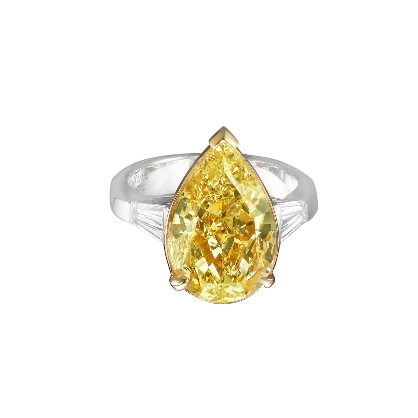 9.14-carat pear-shaped yellow diamond ring is truly captivating, highlighting various important aspects of the piece, including the diamond's characteristics, metal composition, and overall design. The GIA certification ensures the authenticity and